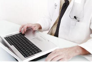 doctores,documentaci�n,Fotolia,internet,notas m�dicas,port�tiles,consultar